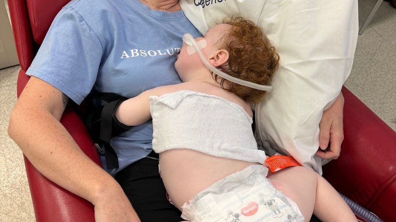 Dusty is now able to have longer cuddles with his parents after his breathing tube was removed.