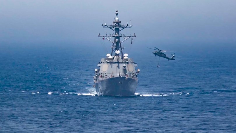 Images released by US Central Command, which says  Iranian forces launched “multiple missiles, drones and small boats” at the three US warships.