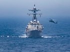 Images released by US Central Command, which says  Iranian forces launched “multiple missiles, drones and small boats” at the three US warships.