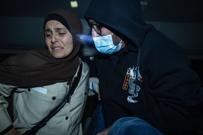 MELBOURNE, AUSTRALIA - NewsWire Photos, MAY 7, 2026. Supporters and people linked to ISIS brides arrive at Melbourne Airport aboard a Qatar flight. Picture: NewsWire / Jason Edwards