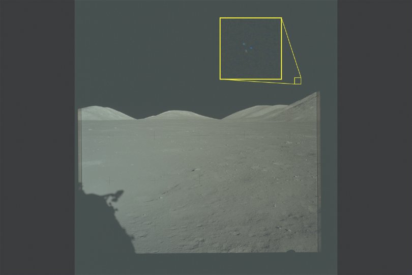The yellow box containing an enlarged area of the original photo in which three lights are visible, from the Apollo 17 mission to the Moon. 
