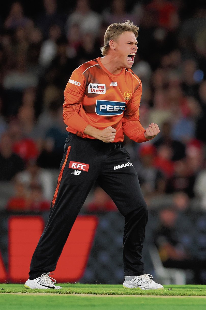 Cooper Connolly of the Scorchers celebrates the wicket of Josh Brown.