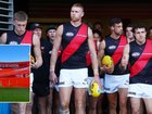 Essendon walk out as the Giants unveil a cheeky banner. 