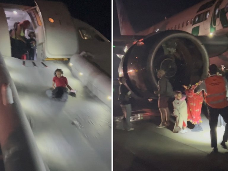 Passengers are evacuated off the plane then pause to take phtotos of the engine where the pedestrian died.