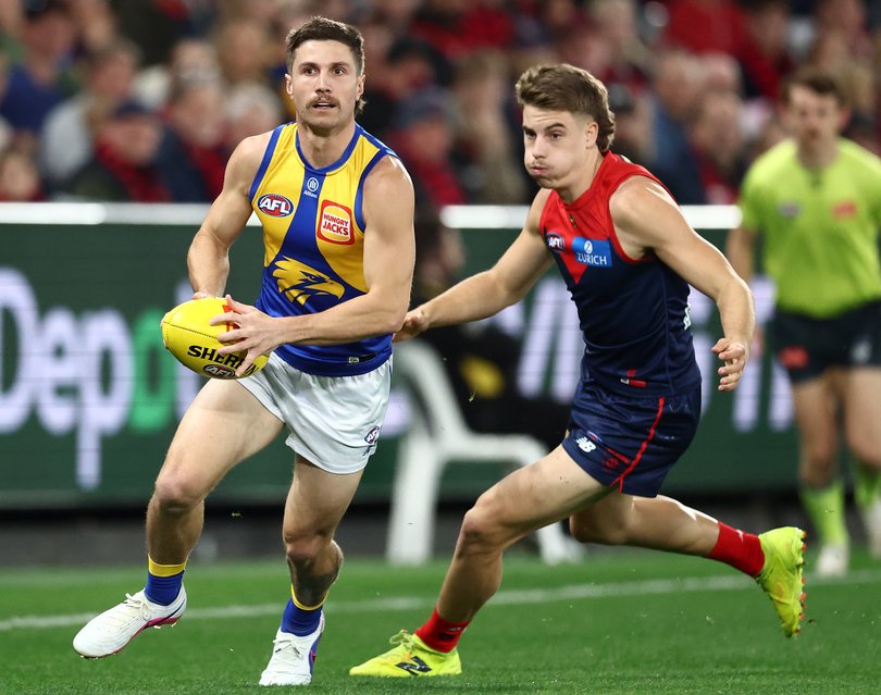Liam Baker runs with the ball.