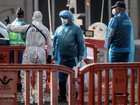Passengers have begun to disembark the cruise ship at the centre of the hantavirus outbreak in a carefully managed repatriation operation involving multiple nations.