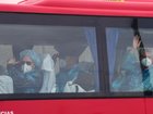 Groups of passengers disembarked from the MV Hondius and were taken to planes to return home. (AP PHOTO)