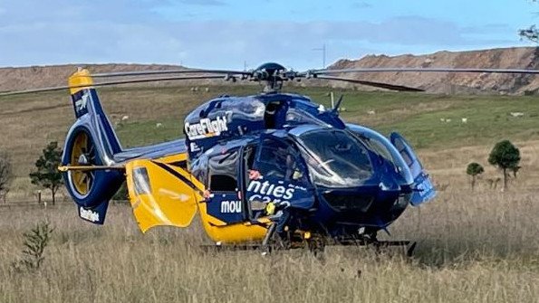 Two skydivers have been taken to hospital after their parachutes became entangled mid-air in a collision southwest of Sydney.