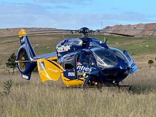 Two skydivers have been taken to hospital after their parachutes became entangled mid-air in a collision southwest of Sydney.
