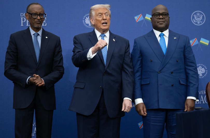 US President Donald Trump gestures as he hosts the signing ceremony of a peace deal with the President of Rwanda Paul Kagame and the President of the Democratic Republic of the Congo Felix Tshisekedi.