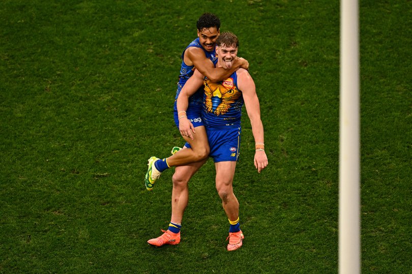 Harley Reid and Malakai Champion celebrate.