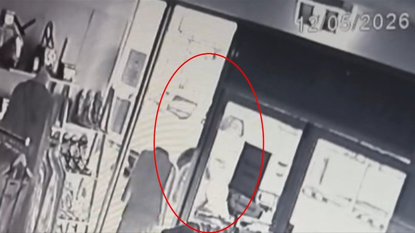 CCTV footage showing the alleged offender with bags of cash.