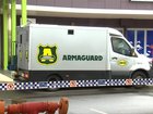 An Armaguard cash-in-transit vehicle at Eli Waters Shopping Centre following the alleged armed robbery on Tuesday morning.