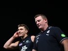 Michael Voss looks on after his team's defeat to Brisbane