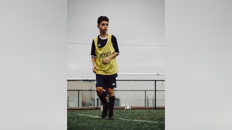 A Melbourne football academy has rallied around 12-year-old player Chris after he was critically injured in a horror train incident.