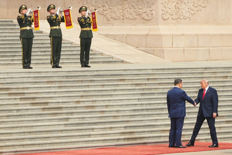 President Donald Trump greets Chinese President Xi Jinping during a welcome ceremony at the Great Hall of the People in Beijing. (AP Photo/Mark Schiefelbein)