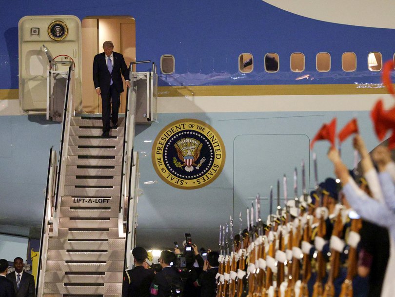 US President Donald Trump arrives in Beijing.