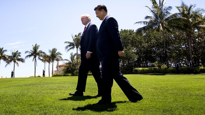 President Donald Trump walks with President Xi Jinping of China at his Mar-a-Lago resort in 2017.