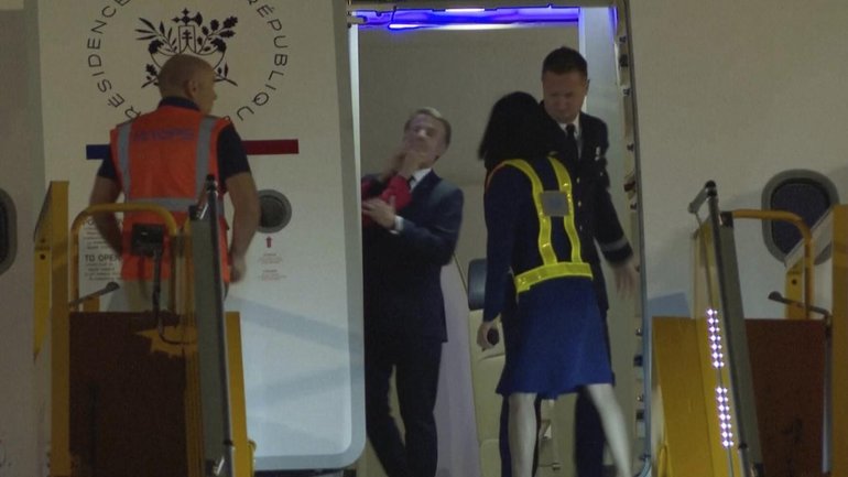 Video captured the moment France's President Emmanuel Macron was pushed away by his wife. 