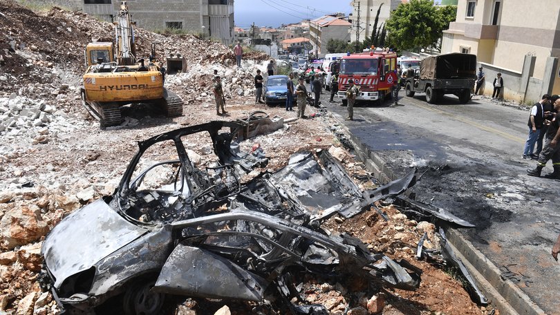 A view of burnt car after an Israeli drone strike in Saadiyat, south of Beirut, Lebanon on May 13, 2026. 