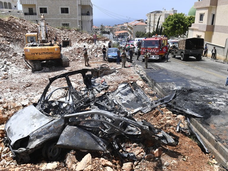 A view of burnt car after an Israeli drone strike in Saadiyat, south of Beirut, Lebanon on May 13, 2026. 