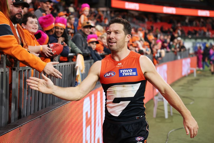 Toby Greene of the Giants celebrates victory.