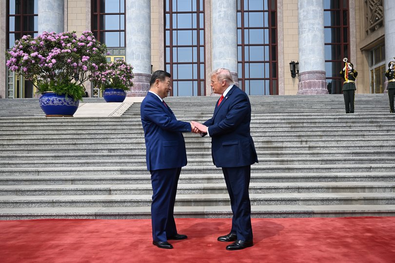 President Xi Jinping of China greets President Donald Trump outside the Great Hall of the People in Beijing during their two-day summit, on Thursday, May 14, 2026. In contrast to his rhetoric about China at home, President Trump spoke in conciliatory terms with Xi Jinping, the Chinese leader. (Kenny Holston/The New York Times)