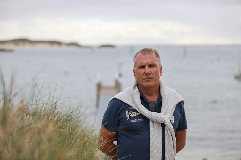 Island visitor Boyd Fraser at Geordie Bay where the man was brought to shore.