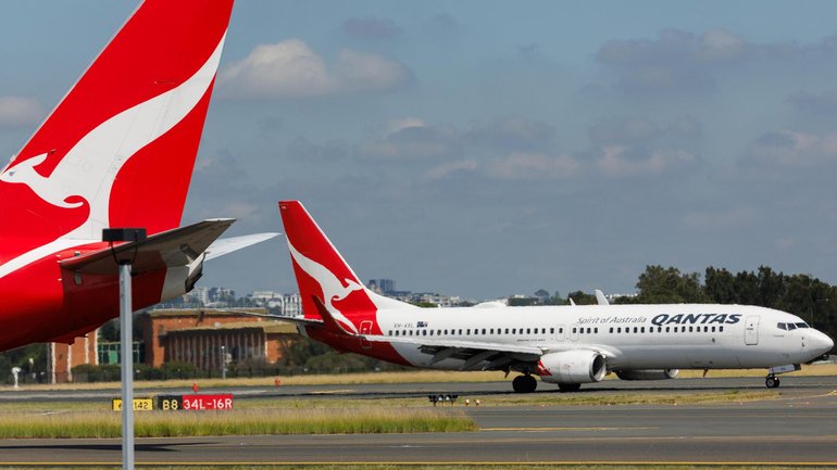 A long-haul Qantas flight was diverted after a passenger allegedly bit a flight attendant, forcing the removal of the man.