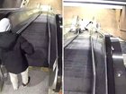 A 40-year-old father has died after becoming trapped in an escalator, with confronting footage showing more than a dozen people walking past as he struggled.