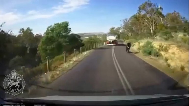 A truck had a near-miss with two motorcyclists in Tasmania.