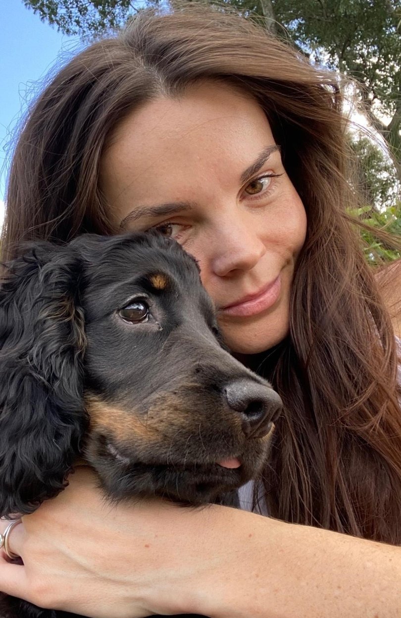 Demi Hagenbach with her dog Swiftie, who is now in intensive care after a life-threatening incident during a walk. Picture: Supplied
