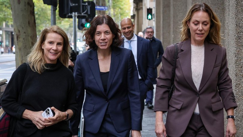 Cate Sayers (right) walks out of court with her lawyer Sue Chrysanthou and actor Rachel Griffiths. Picture: NewsWire / David Caird