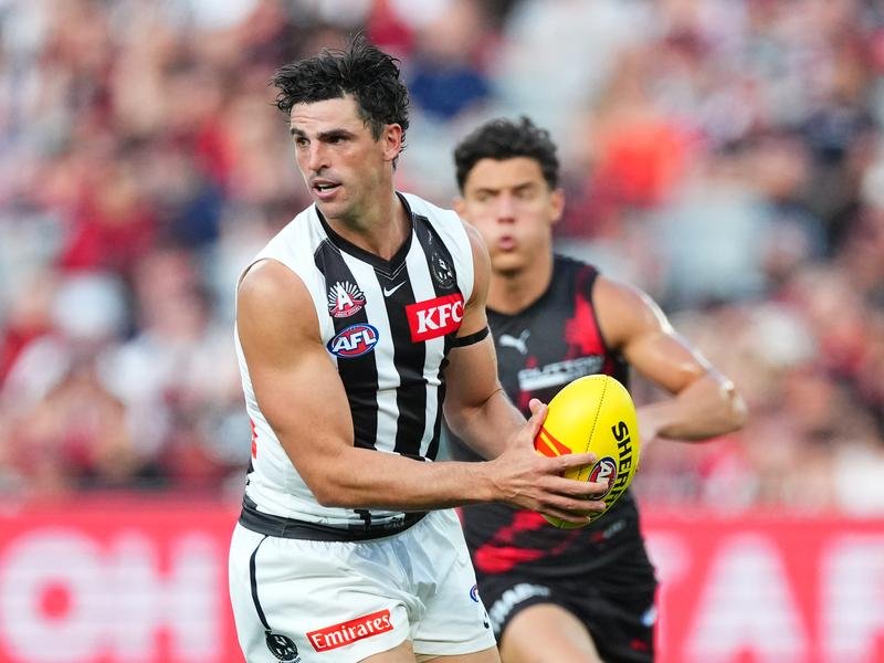 The man with time on his hands: Scott Pendlebury will break the AFL's games record this weekend.