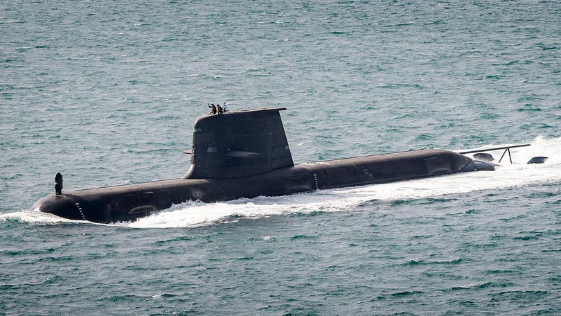 A Collins-class submarine heading out to sea from Fleet Base West.