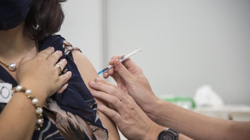 A drop in vaccinations has been blamed for the widespread outbreak of a respiratory disease. 