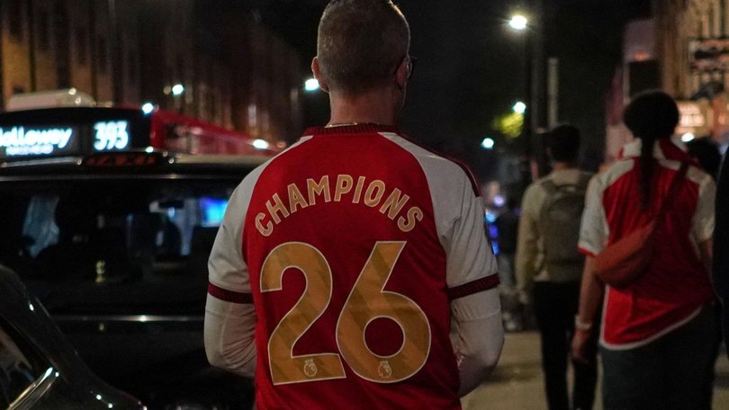 Arsenal supporters have hit the North London streets to celebrate the club's latest title win. (AP PHOTO)