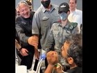 Images from the video posted by Israeli minister Ben-Gvir showing detained Gaza flotilla activists being taunted and bound.