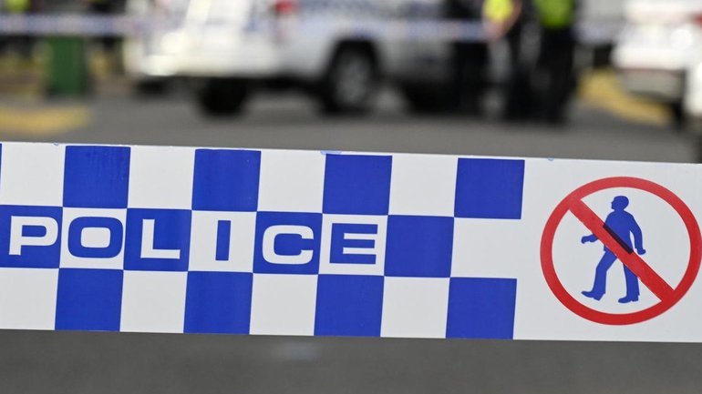 Police were called to an intersection in Cairns after one of their vehicles struck a woman. 