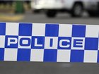 Police were called to an intersection in Cairns after one of their vehicles struck a woman. 