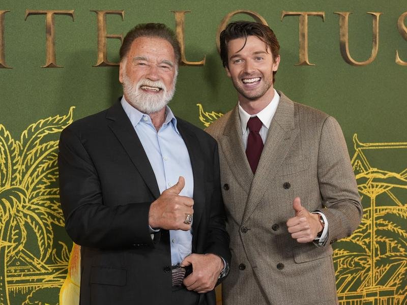 Patrick Schwarzenegger with his dad, Arnie. (AP PHOTO)