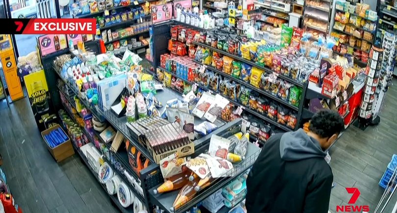 The man kicked drinks, pulled food off shelves.