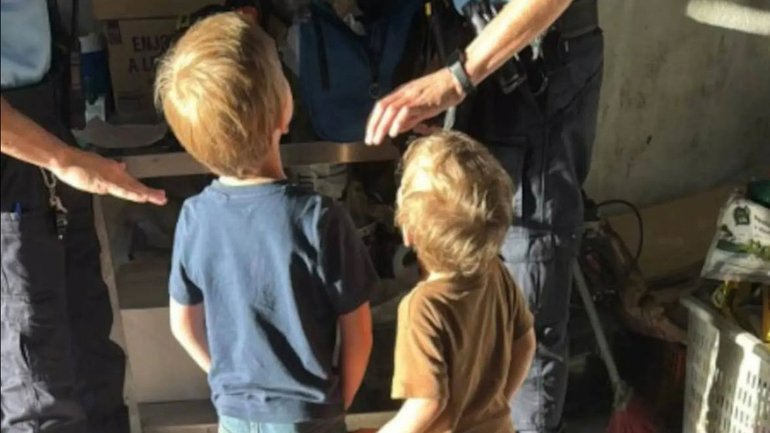 The boys were found on the side of the road.