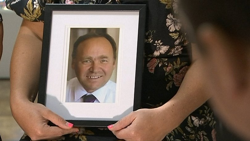 Kalman Tal died from blood loss after his lower leg was amputated above the ankle, jurors were told.
