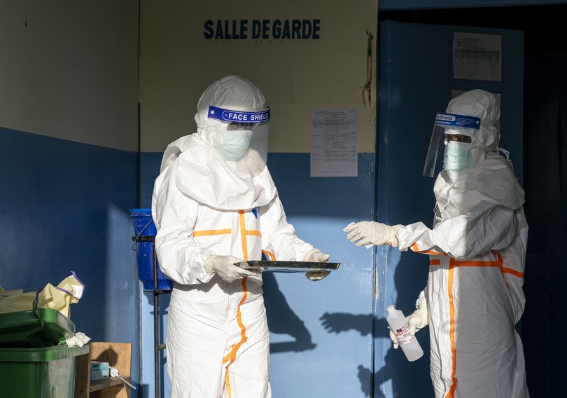 Health workers prepare medicine for patients with Ebola  at the Rwampara General Referral Hospital, Ituri Province, in eastern Democratic Republic of the Congo.