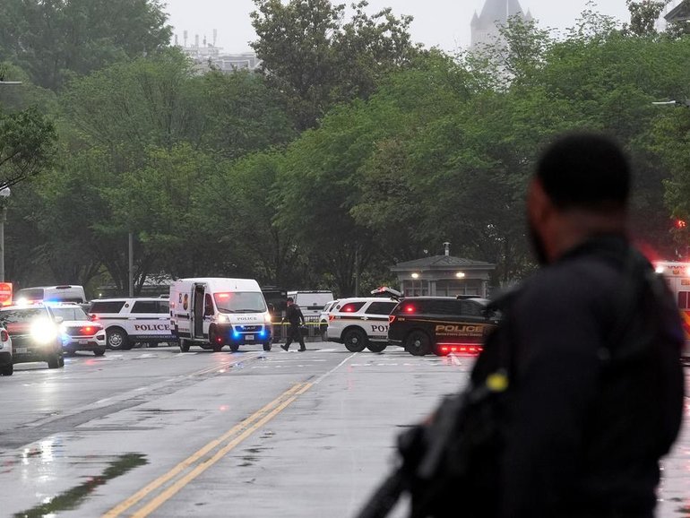 A gunman has died after being shot at a security checkpoint near the White House. (AP PHOTO)