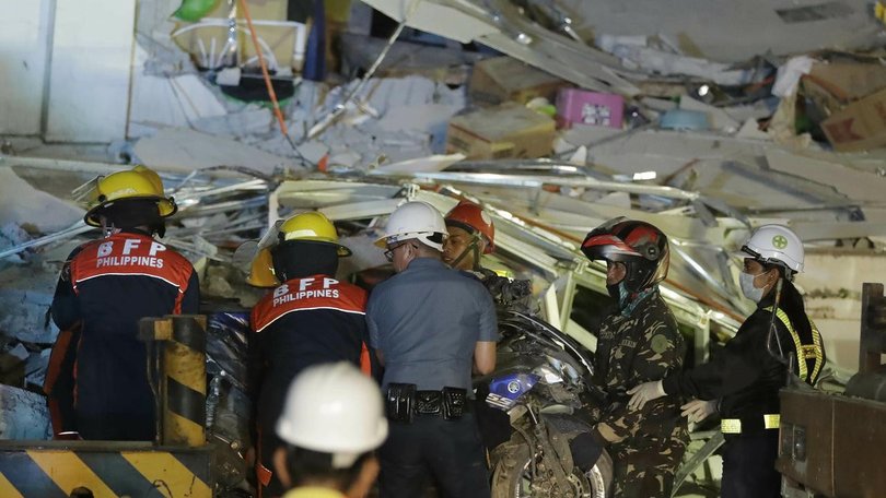 More than 100 police and other government personnel are scrambling to rescue those who are trapped.