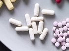 A tray of supplements. A central claim about NAD+ isn’t as straightforward as influencers make it out to be.