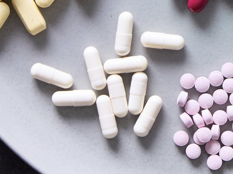 A tray of supplements. A central claim about NAD+ isn’t as straightforward as influencers make it out to be.