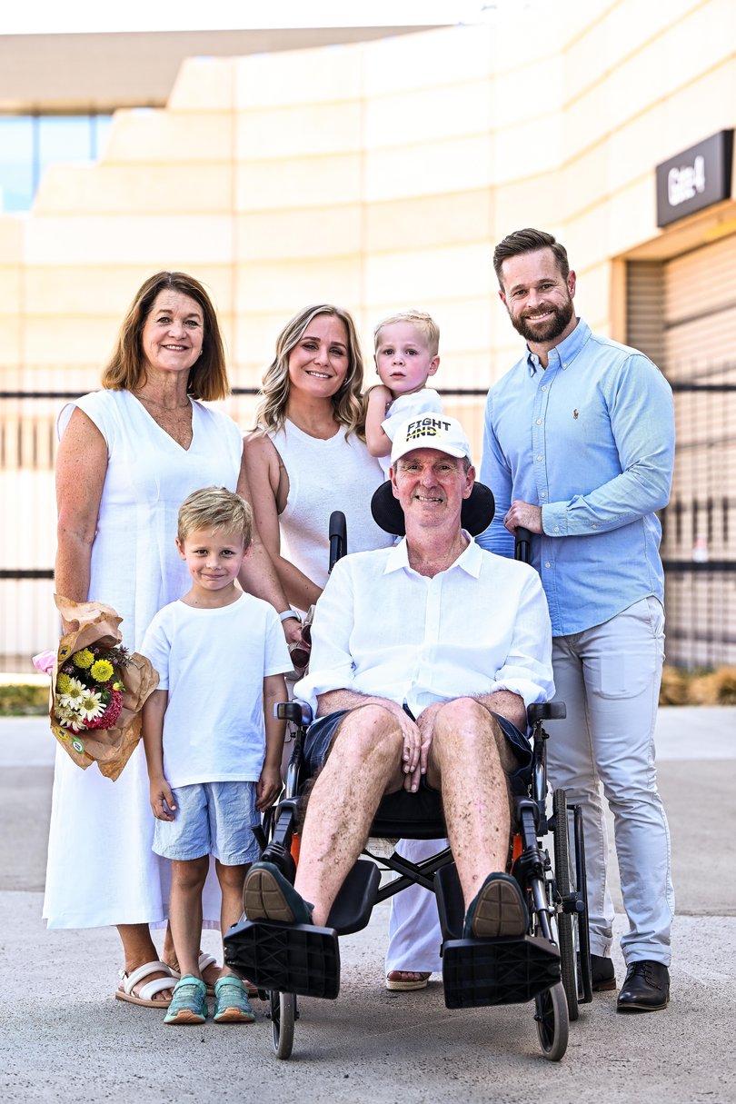 Neale Daniher with his son Luke, wife Jan and family pose for a photo after All Abilities and Purple Hands walk in April 2025.